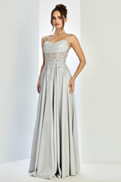 Beautiful sparkly dress with open corset at back. elegant touch of pocket in the skirt. 3232 by ADORA DESIGN