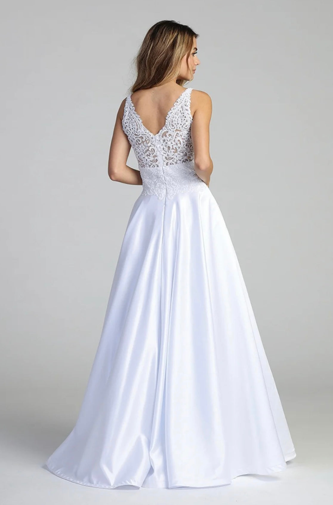 This dress is perfect for your unforgettable moment. With elegant satin , flower appliques and beads. 7673 by LET’S CORP