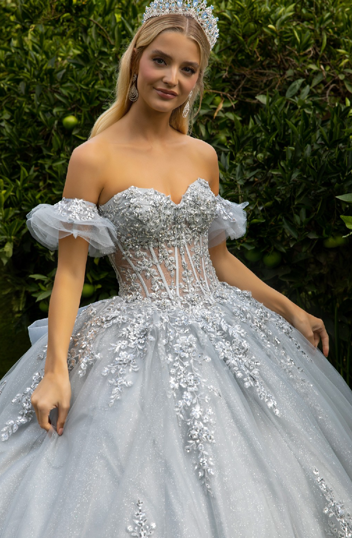 This stunning ball gown with its detached armband sleeves, sweetheart neckline, and corset bodice will be an eye-opener. GL3519 GLS BY GLORIA